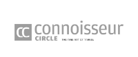 Graues Logo mit den Buchstaben "CC" in einem Quadrat links. Rechts daneben steht "connoisseur CIRCLE" und darunter "THE FINE ART OF TRAVEL."